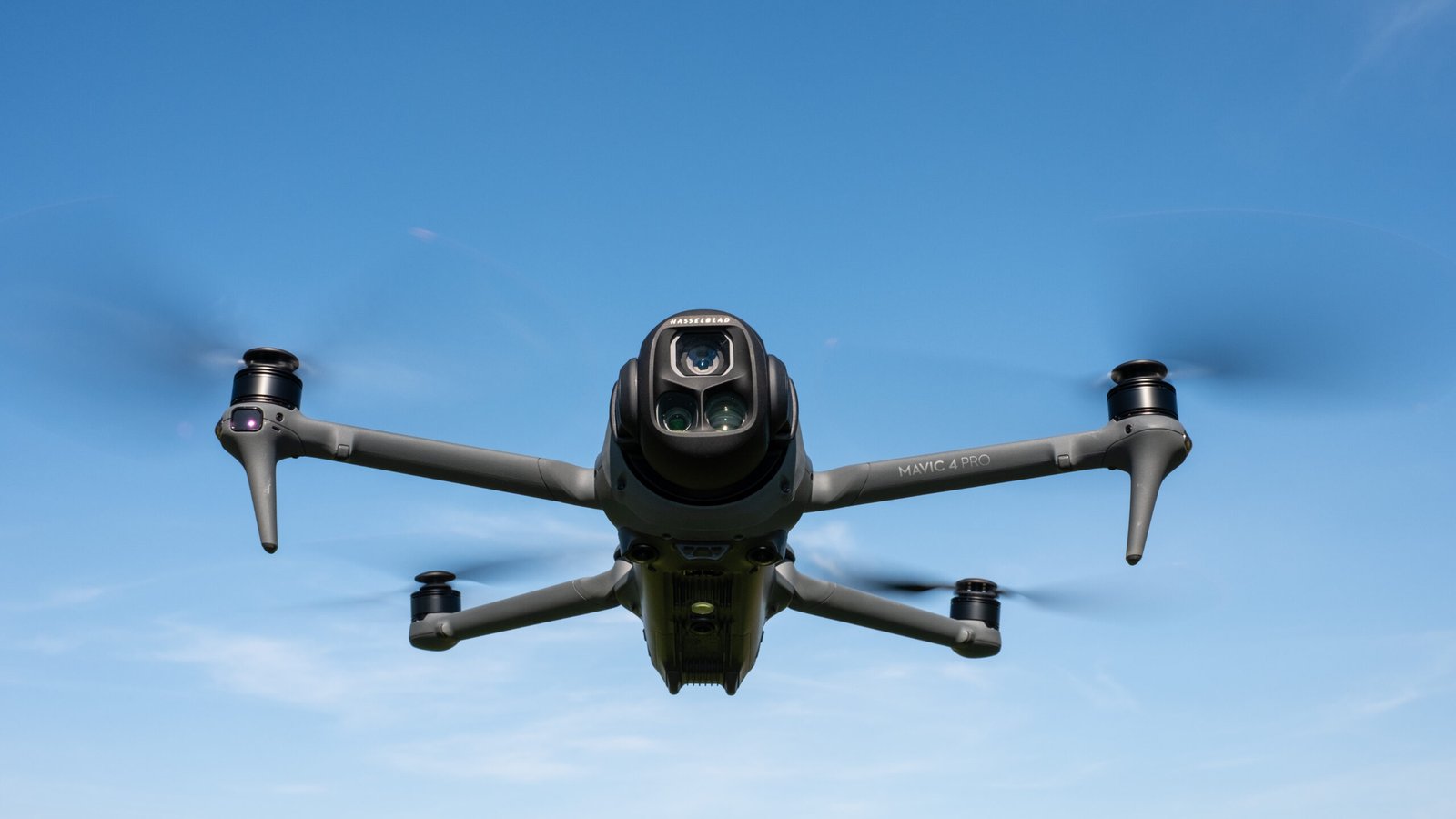 Comparison of drone with and without camera showing sensor size chart and budget toy drone without lens